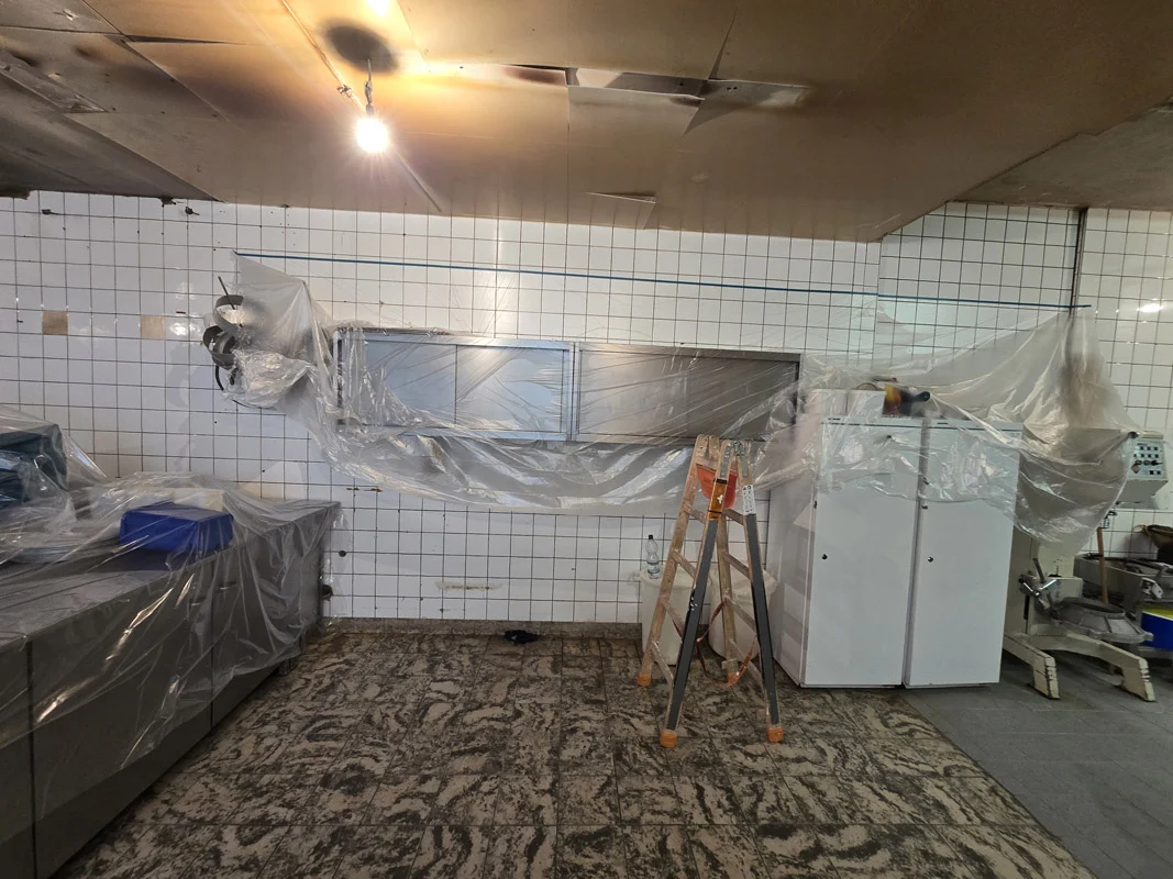 Bakery equipment sealed under protective sheeting – Illingen
